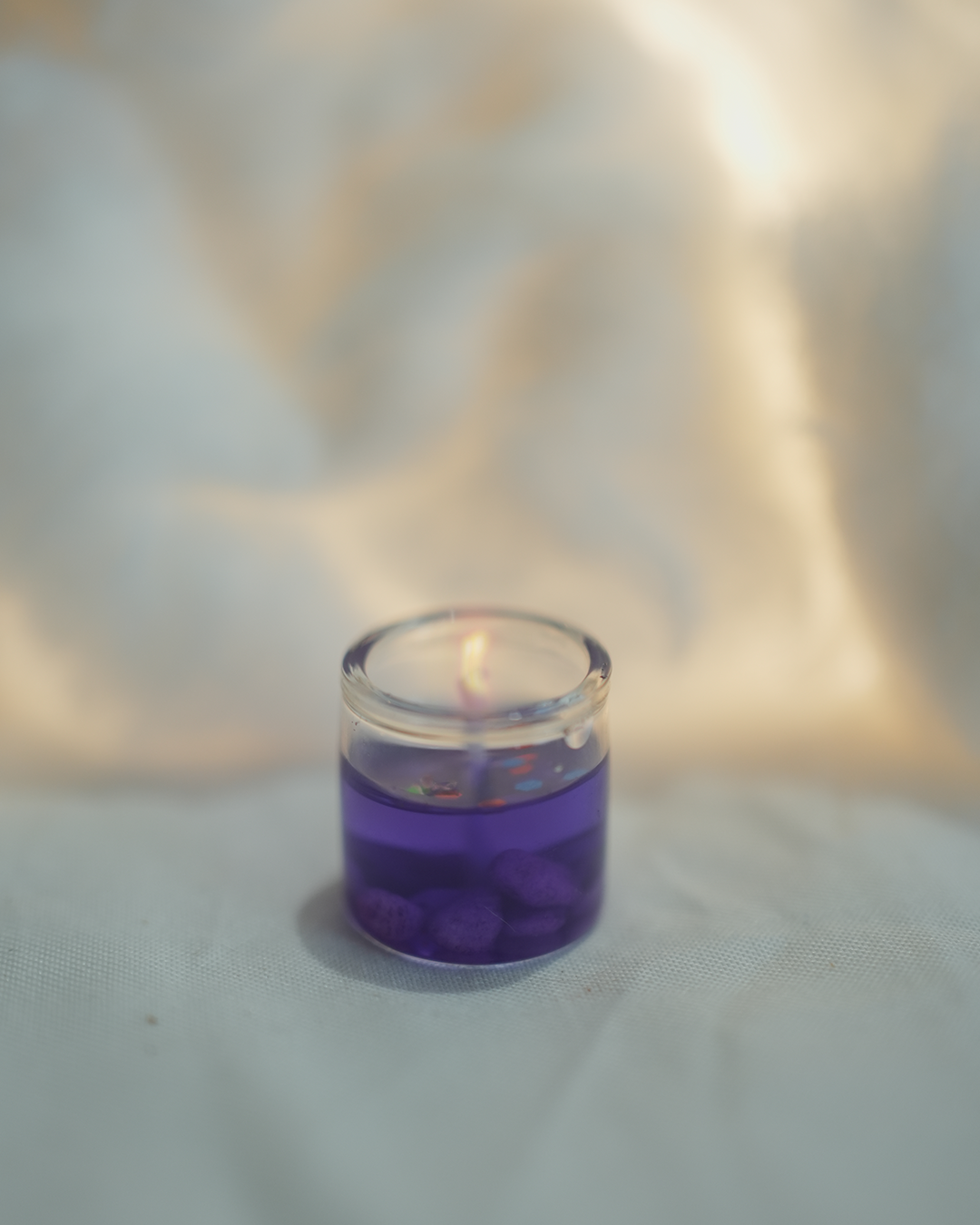 Tiny purple gel wax candle, perfect for home decor and Christmas gifting.