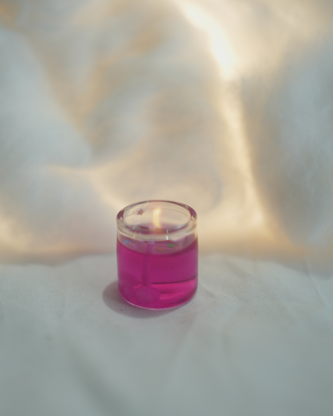 Tiny pink gel wax candle, perfect for home decor and Christmas gifting.